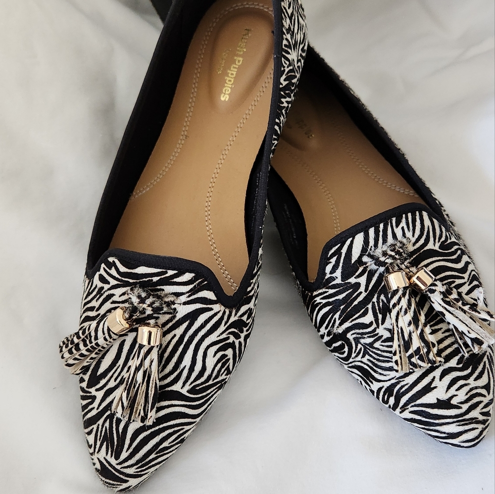 Hush Puppies flats.  Women's size 7.   Calf hair animal print .  Worn once